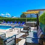 Mijo Villa *